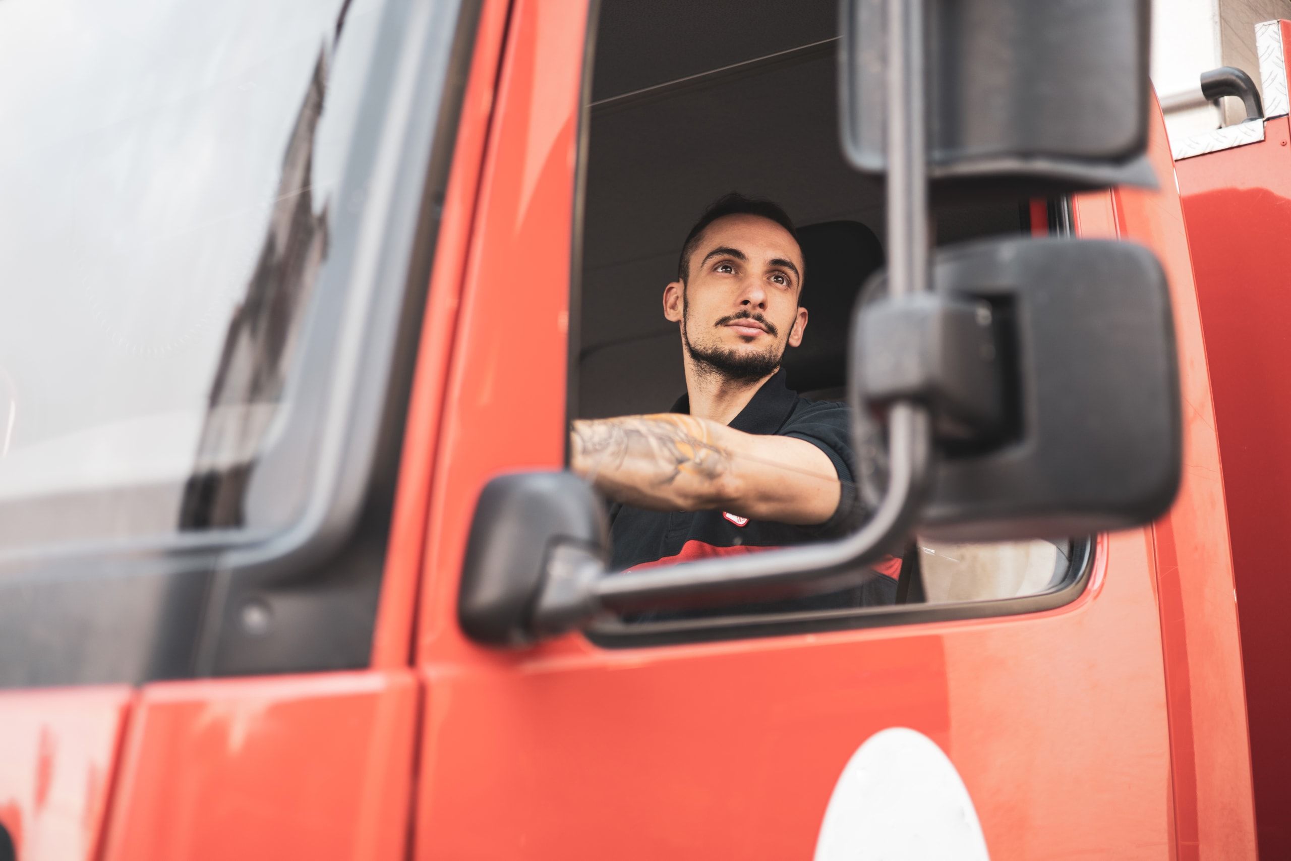 HGV driver looking out window