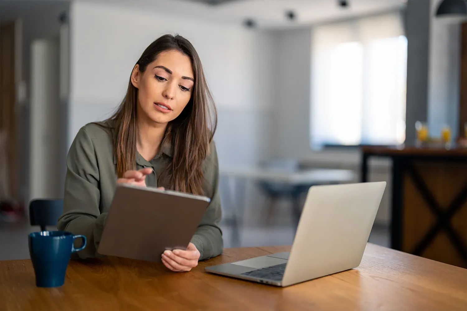 Women on tablet and laptop